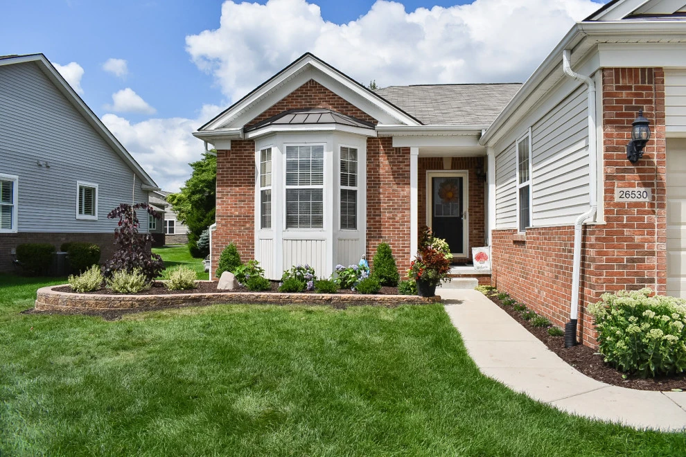 Front Landscape Makeover + Garden Wall by GLC Lawn & Landscaping LLC - Photo 2