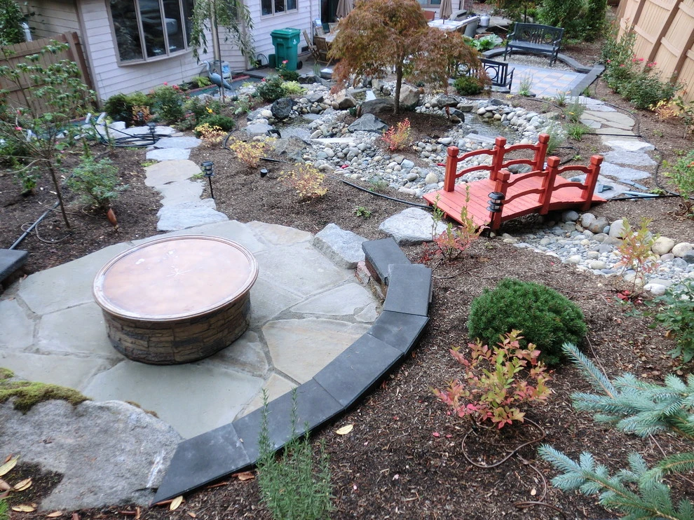Fire Features by Green Spaces Landscaping - Photo 20