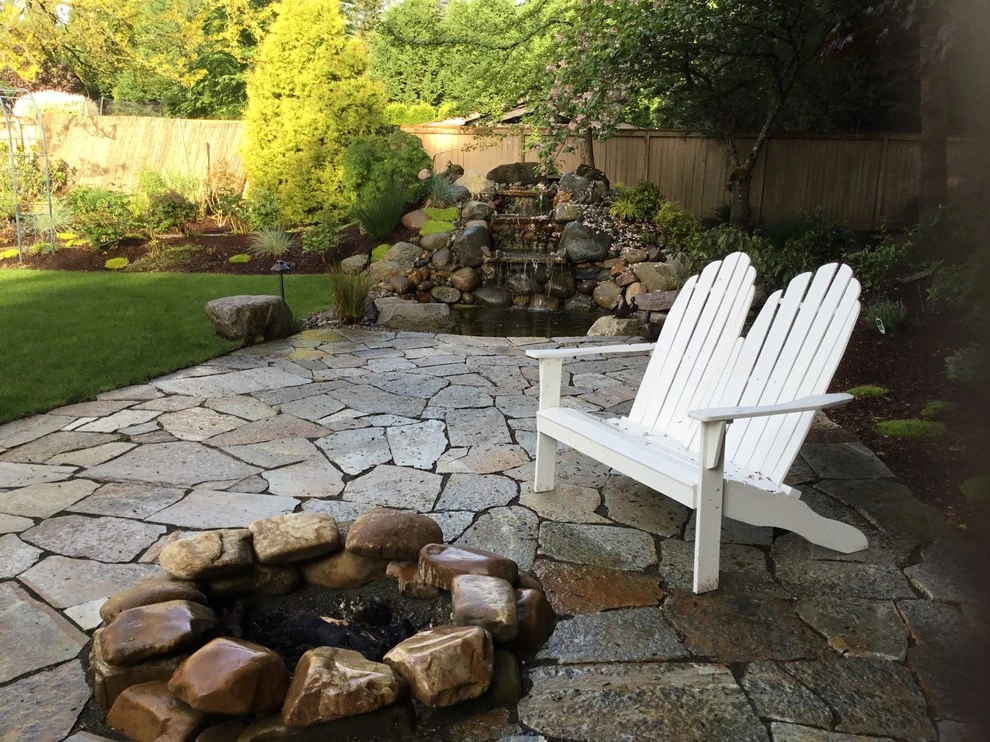 Fire Features by Green Spaces Landscaping - Photo 19