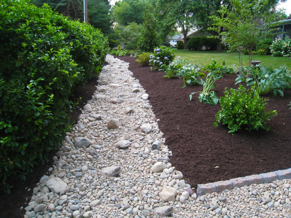 Dry-Creek Riverbeds by DiSabatino Landscaping And Tree Care - Photo 17