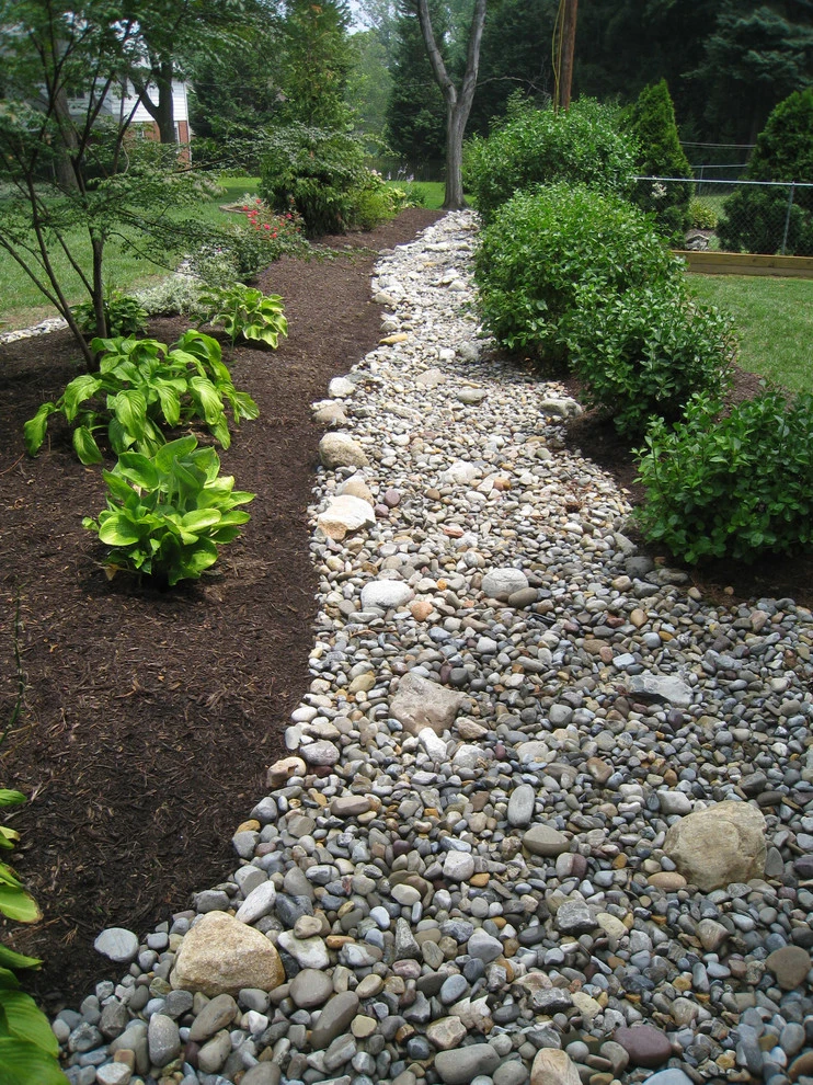 Dry-Creek Riverbeds by DiSabatino Landscaping And Tree Care - Photo 8