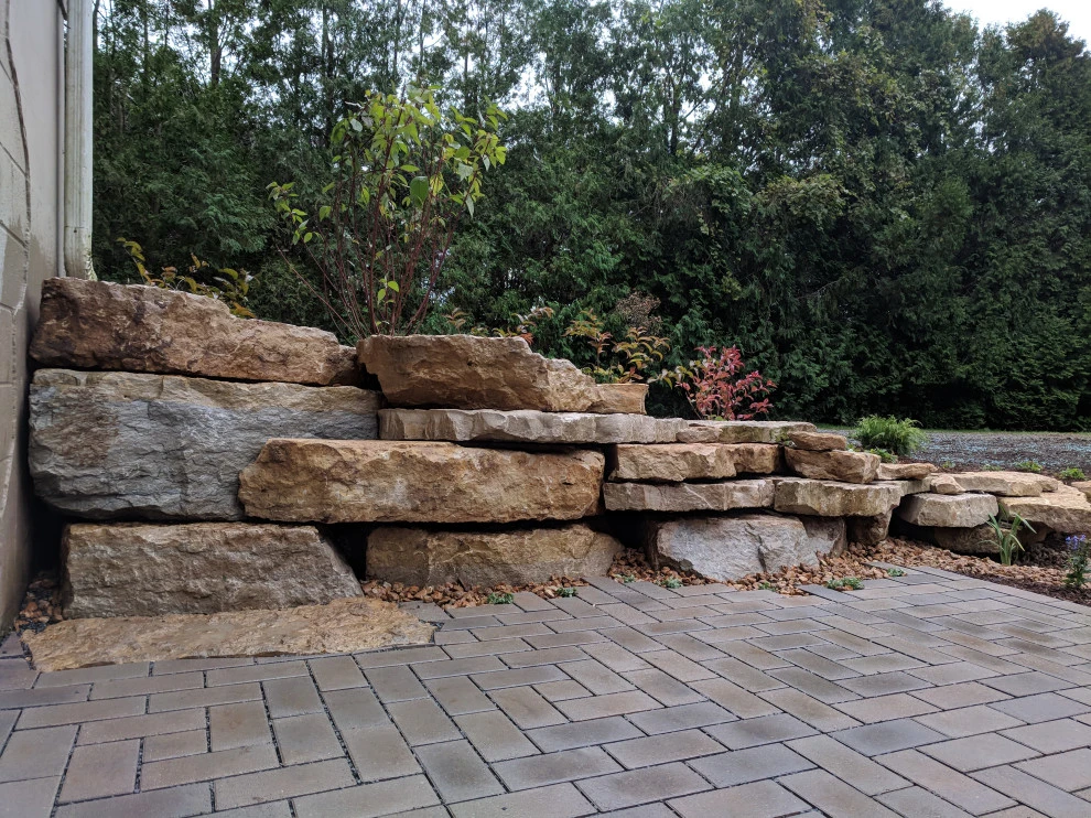 Backyard Natural Featuring Permeable Paver Solutions by Eco Harmony Landscape & Design, LLC. - Photo 16