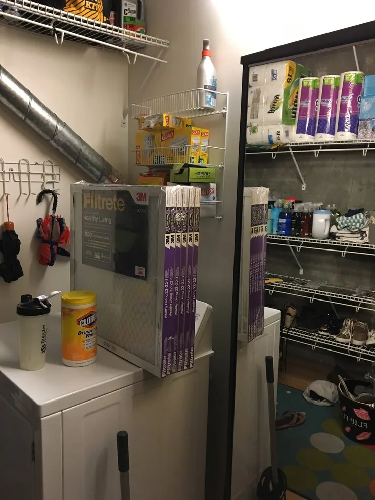 Urban Nursery Storage and Laundry Area by Abbey Claire Professional Organizing - Photo 9