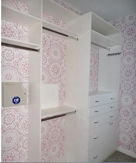 Coastal Cottage Closet with Whimsical Wallpaper Backing by Closet Solutions - Photo 2