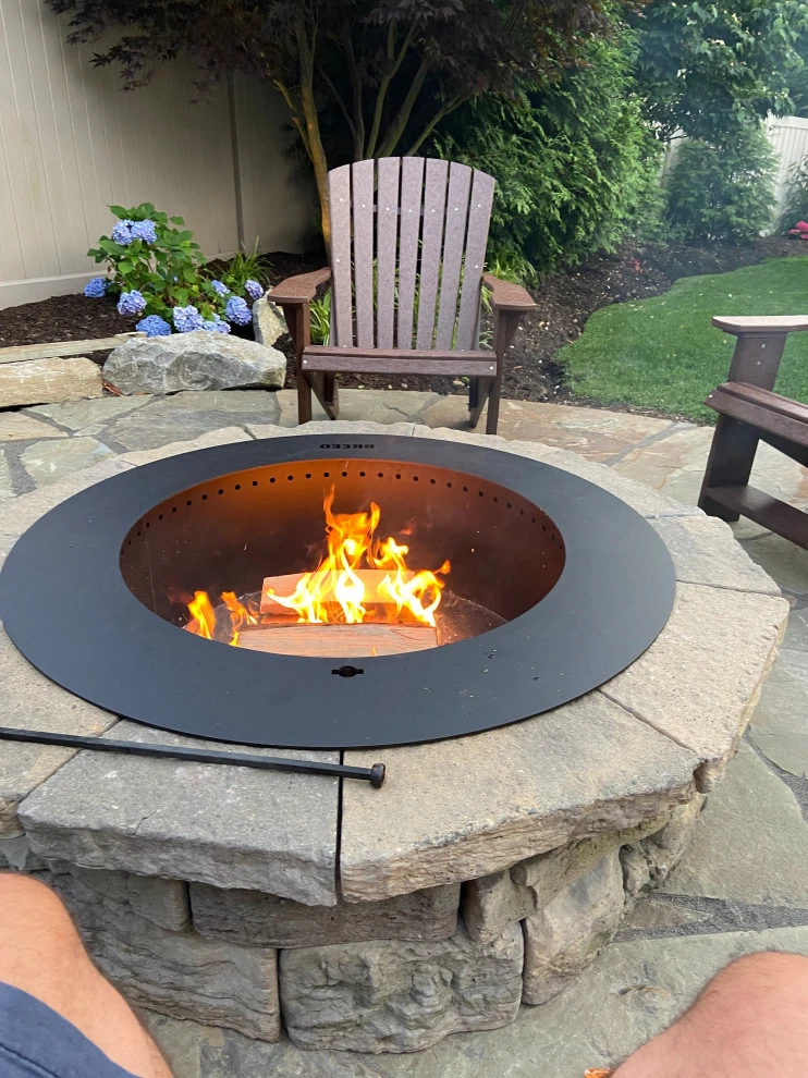 Separate gathering area for friends with Nicolock fire pit by Joseph Matthew Landscape Inc Design & Build - Photo 4
