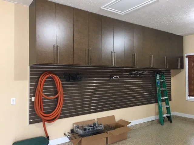 Garage Storage Solutions by Tailored Living Featuring Premier Garage - Photo 14