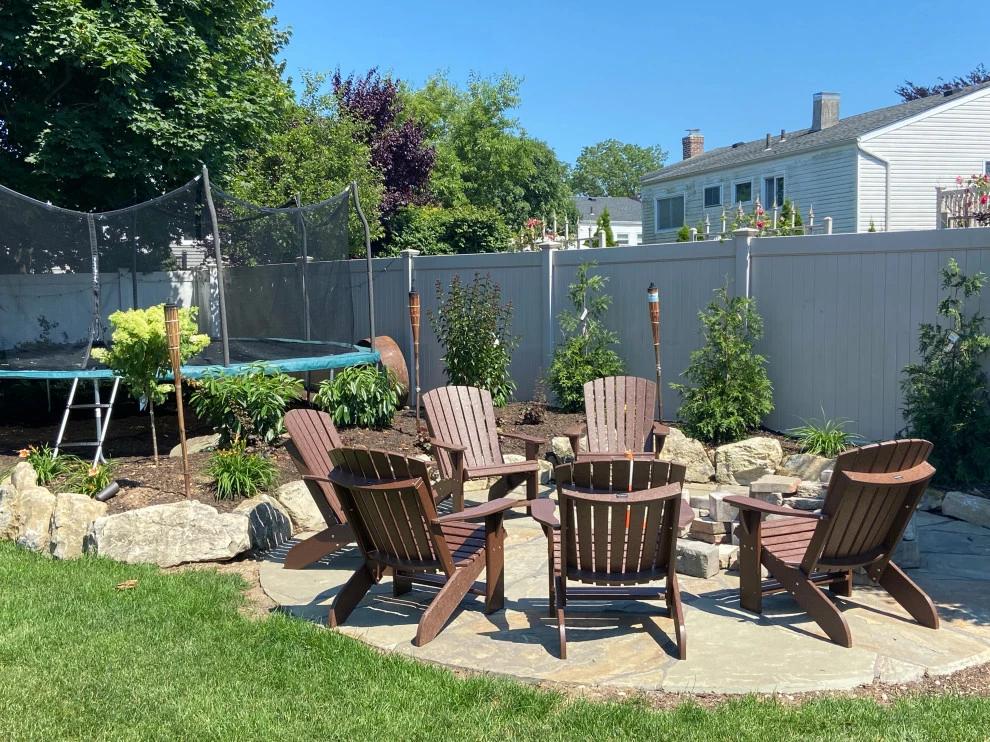 Separate gathering area for friends with Nicolock fire pit by Joseph Matthew Landscape Inc Design & Build - Photo 3