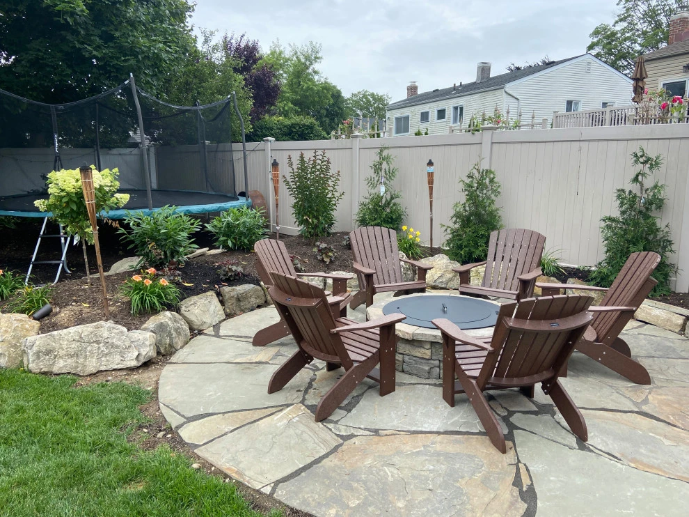 Separate gathering area for friends with Nicolock fire pit by Joseph Matthew Landscape Inc Design & Build - Photo 2