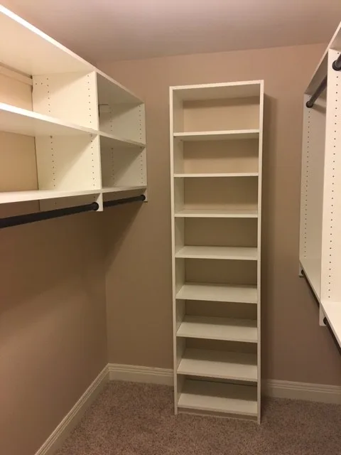 Primary Wardrobe by Tailored Living Featuring Premier Garage - Photo 15