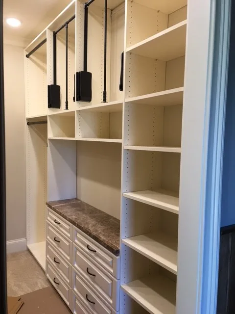 Primary Wardrobe by Tailored Living Featuring Premier Garage - Photo 11