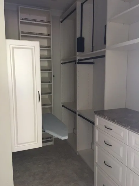Primary Wardrobe by Tailored Living Featuring Premier Garage - Photo 8