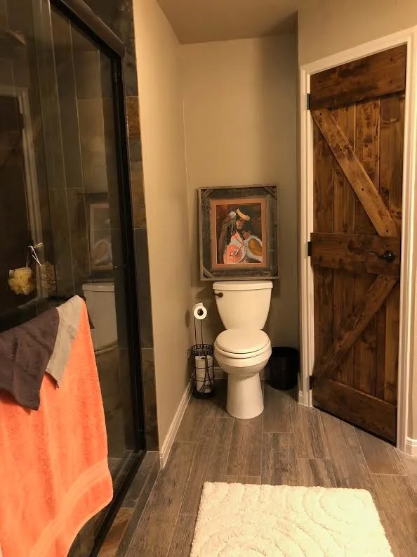 Radiant Barn Door Bathroom Renovation by Lace Designs - Photo 5