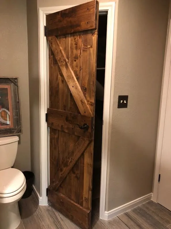 Radiant Barn Door Bathroom Renovation by Lace Designs - Photo 2