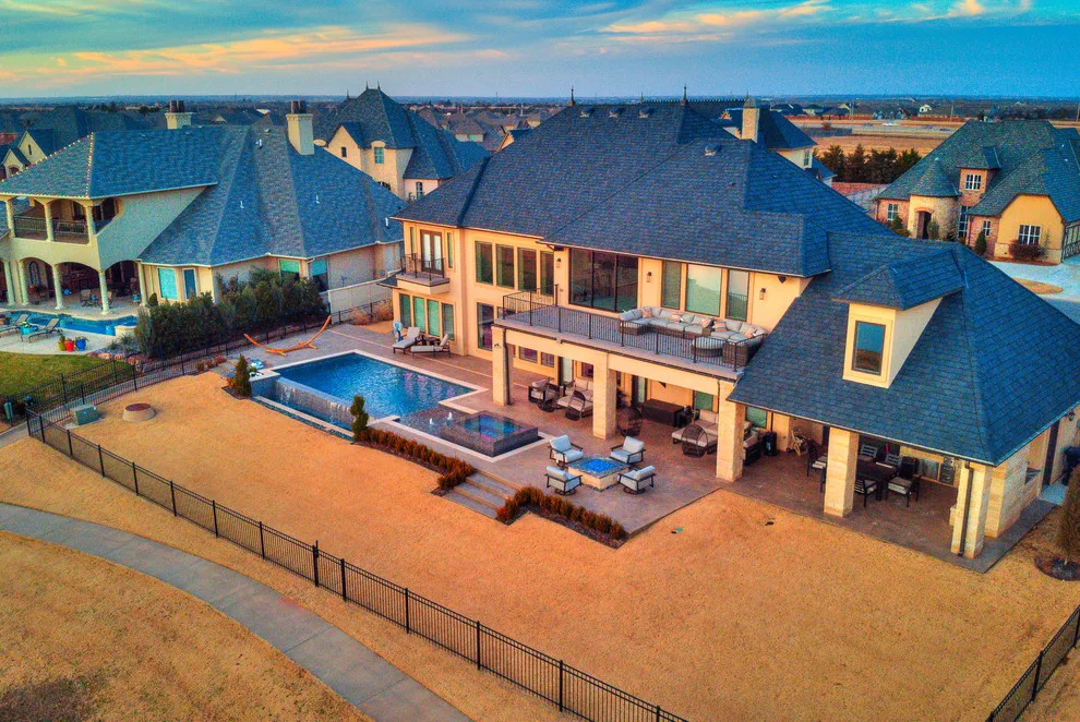 Cobblestone Lakeside Home by Jaggers Home Design - Photo 12