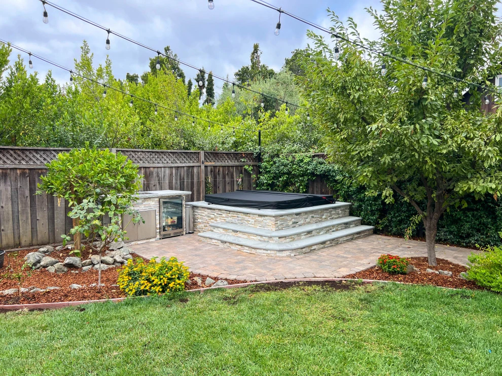 Backyard Oasis with 3D Design: Kitchen, Jacuzzi, Lighting, Pavers, and Shower! by San Jose Tree Service & Landscaping - Photo 2