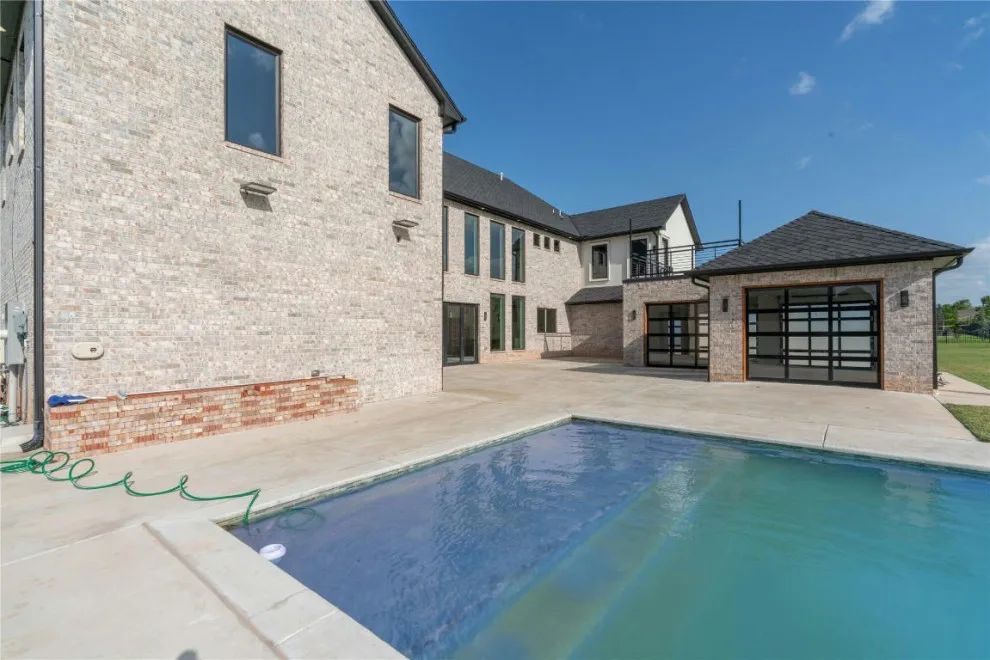 Edmond Oak Tree Golf Course Residence by Jaggers Home Design - Photo 45