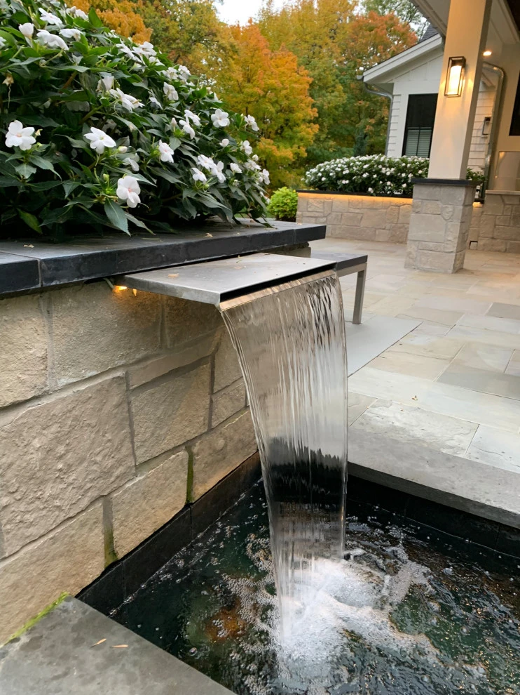Wayzata Modern Farmhouse Entertainment Addition by Stonepocket Unique Landscapes - Photo 14