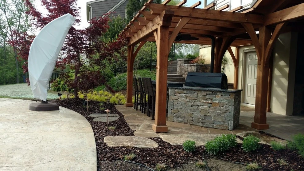 Covered Outdoor Kitchen by Vintage Landscaping - Photo 3