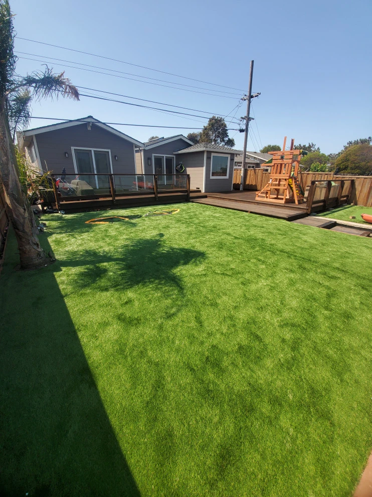 putting green and turf for backyard by Westcoast Hardscape - Photo 5