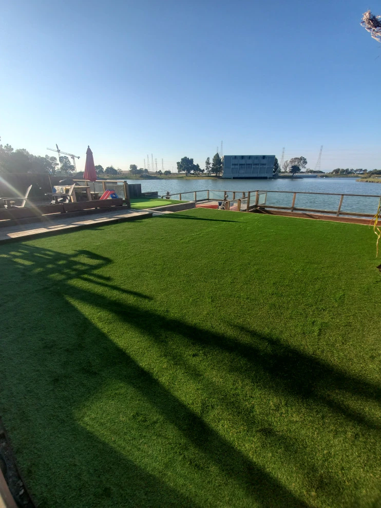 putting green and turf for backyard by Westcoast Hardscape - Photo 4
