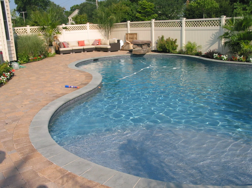 Arnold Pool with Natural Stone Waterfall by Honeysuckle Nursery & Design - Photo 2