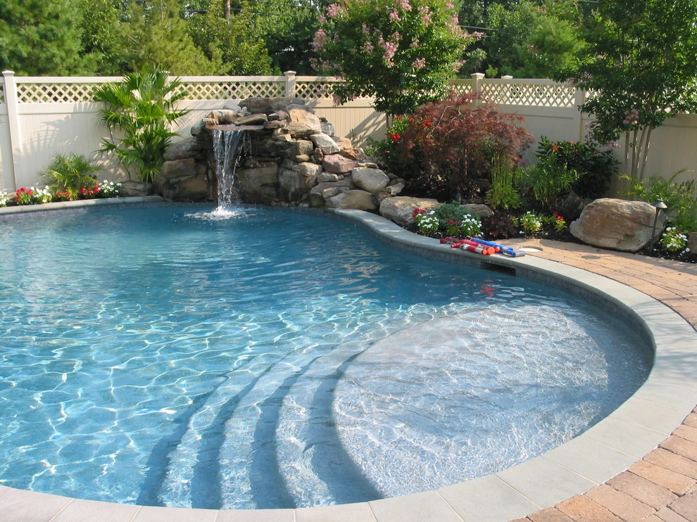 Arnold Pool with Natural Stone Waterfall by Honeysuckle Nursery & Design - Photo 5