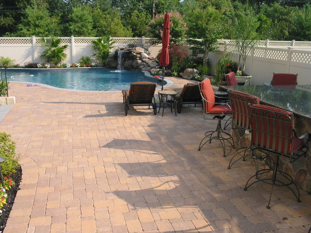 Arnold Pool with Natural Stone Waterfall by Honeysuckle Nursery & Design - Photo 8
