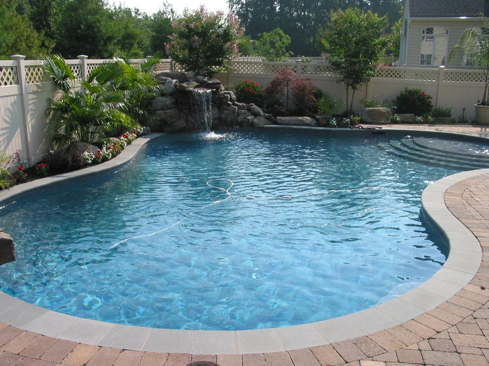 Arnold Pool with Natural Stone Waterfall by Honeysuckle Nursery & Design - Photo 9
