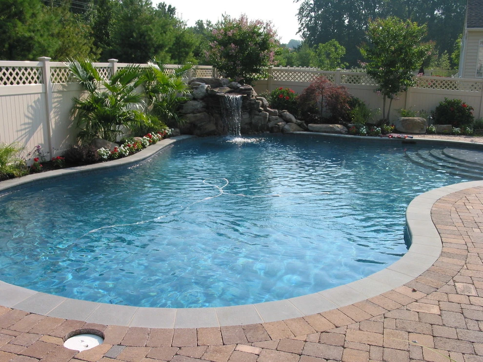 Arnold Pool with Natural Stone Waterfall by Honeysuckle Nursery & Design - Photo 4
