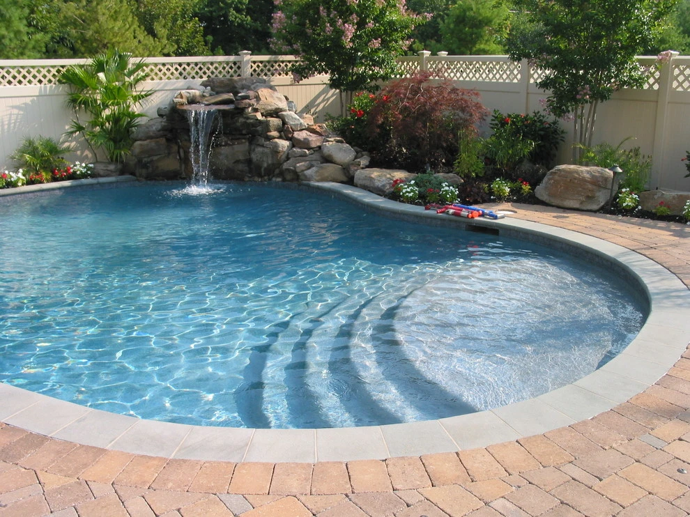 Arnold Pool with Natural Stone Waterfall by Honeysuckle Nursery & Design - Photo 7