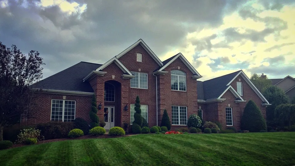 Complete Brick Two-Story by Green Team Design, Inc. - Photo 2