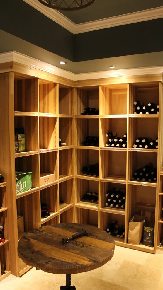 Wine cellar in the basement by APEC Electrical Contractors, Inc. - Photo 7