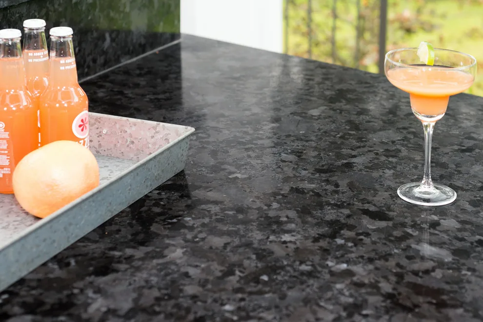 Stone and Stucco Patio Kitchen by Evalia Design, LLC. - Photo 6