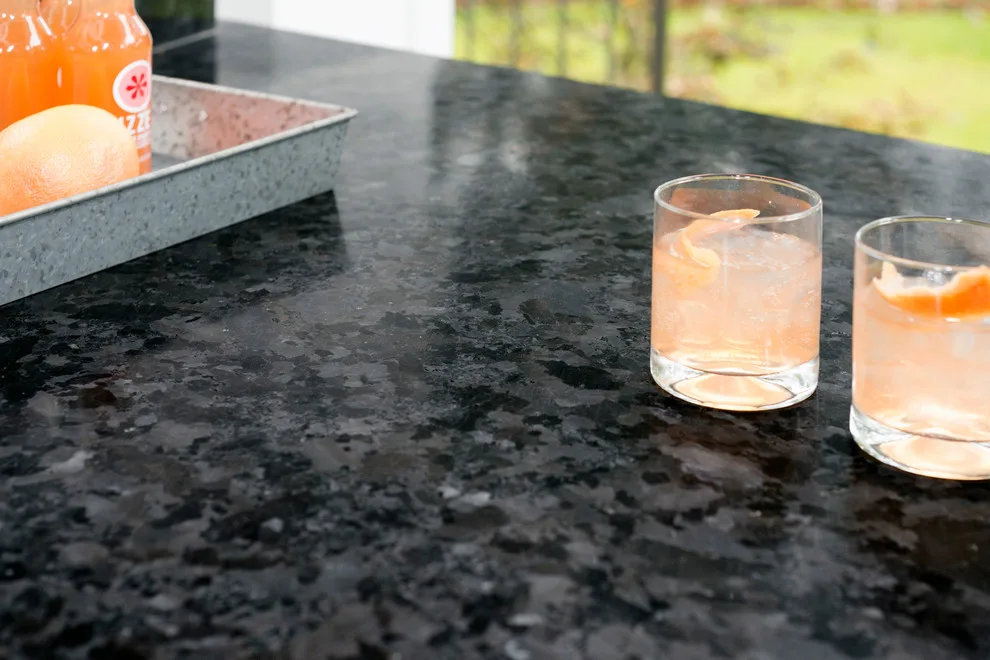 Stone and Stucco Patio Kitchen by Evalia Design, LLC. - Photo 2