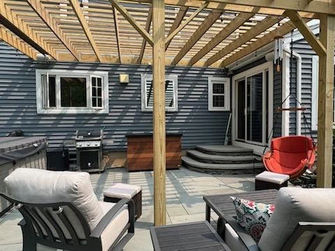 Total back yard transformation by Aureli Landscaping & Custom Stone Work - Photo 3