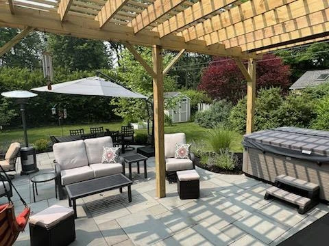 Total back yard transformation by Aureli Landscaping & Custom Stone Work - Photo 5