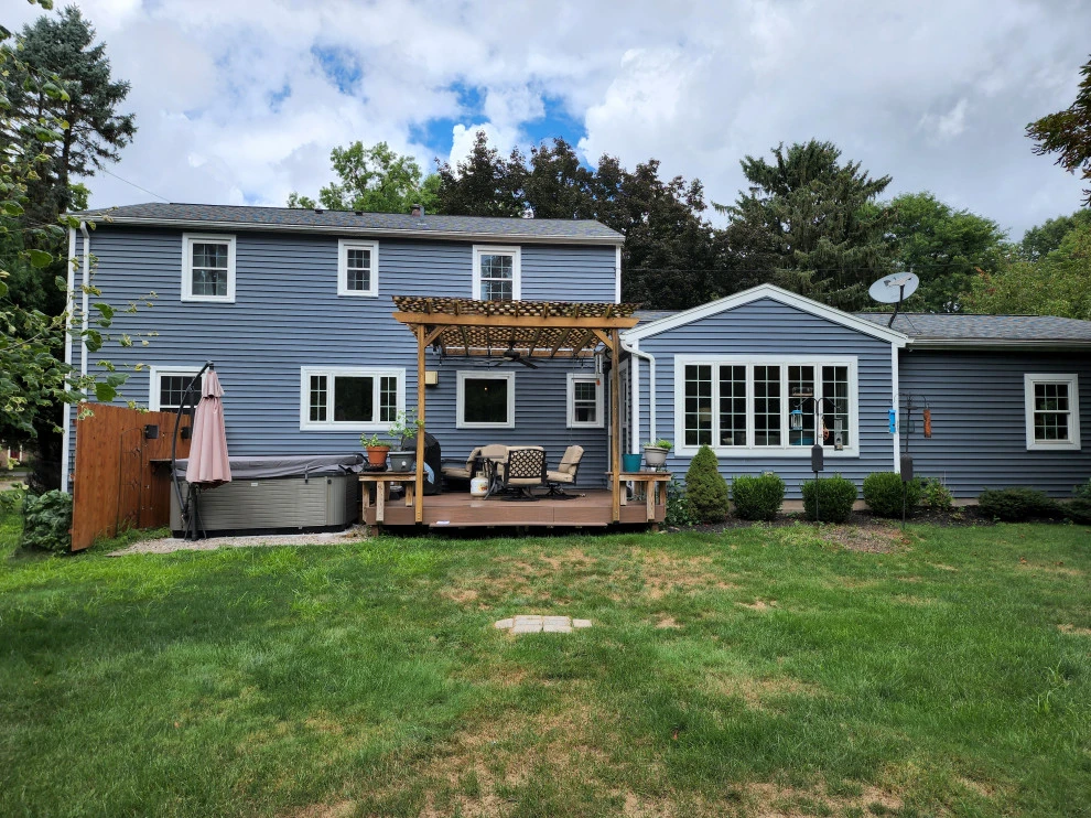 Total back yard transformation by Aureli Landscaping & Custom Stone Work - Photo 7