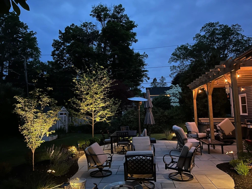 Total back yard transformation by Aureli Landscaping & Custom Stone Work - Photo 4