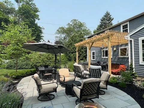 Total back yard transformation by Aureli Landscaping & Custom Stone Work - Photo 8