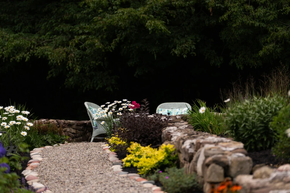 Showcase front landscaping with terraces by Aureli Landscaping & Custom Stone Work - Photo 3