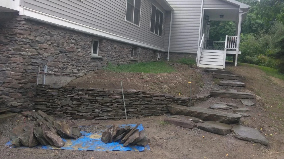 lake house landscape by Aureli Landscaping & Custom Stone Work - Photo 4