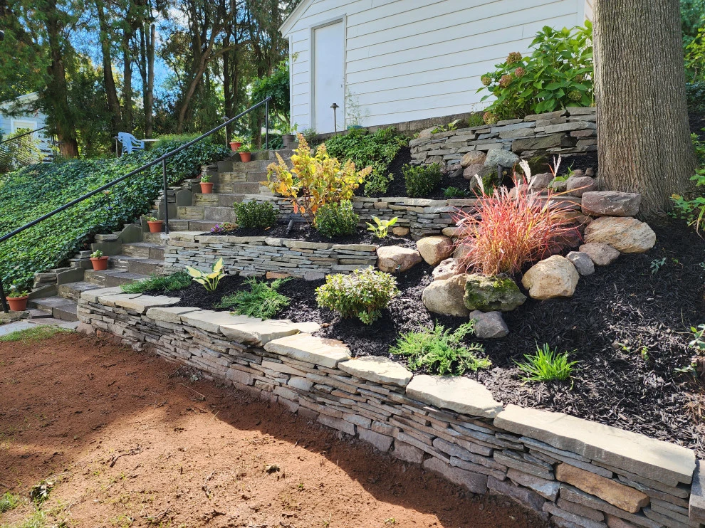 dry stacked wall by Aureli Landscaping & Custom Stone Work - Photo 4