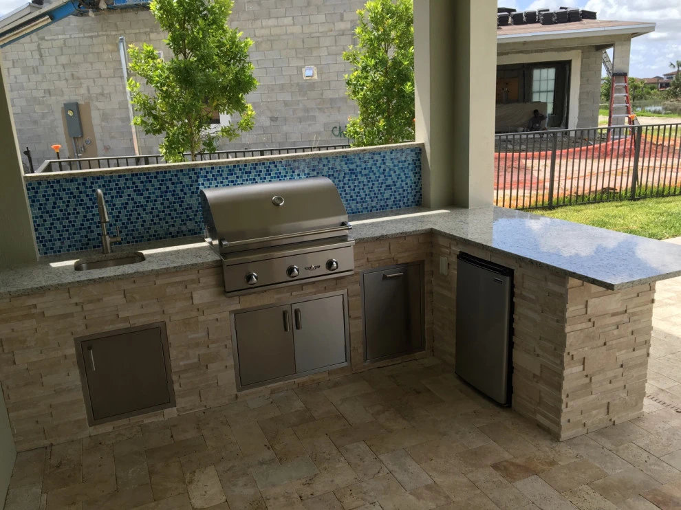 Outdoor Kitchen with Ledge Stone by Broward Landscape, Inc. - Photo 12