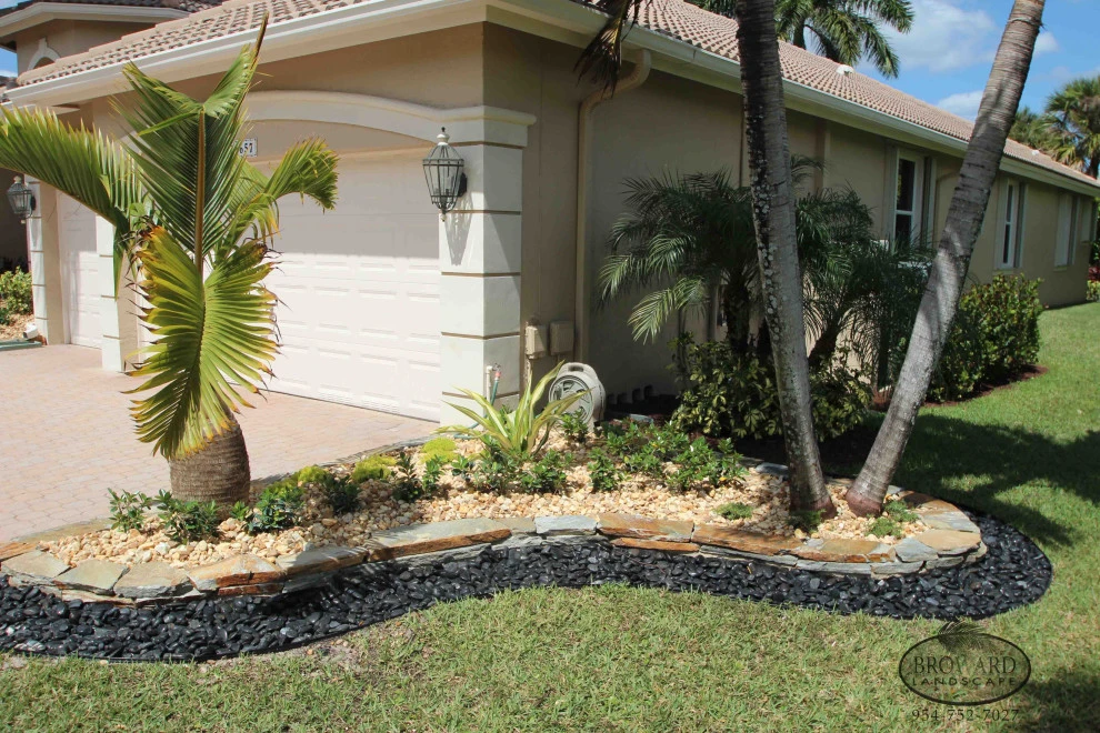 Stone Landscape Rock Border Walls by Broward Landscape, Inc. - Photo 15