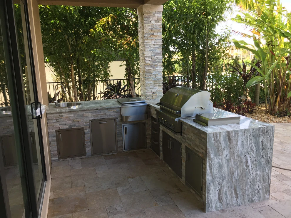 Outdoor Kitchen with Ledge Stone by Broward Landscape, Inc. - Photo 15