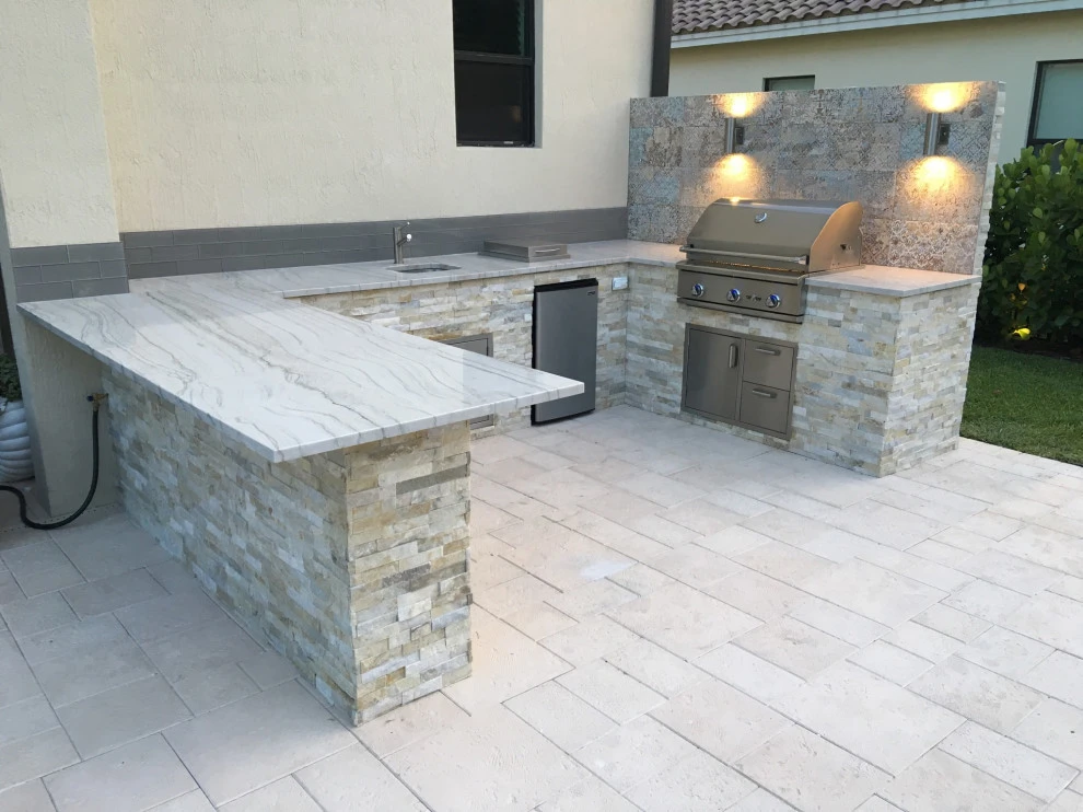 Outdoor Kitchen with Ledge Stone by Broward Landscape, Inc. - Photo 14