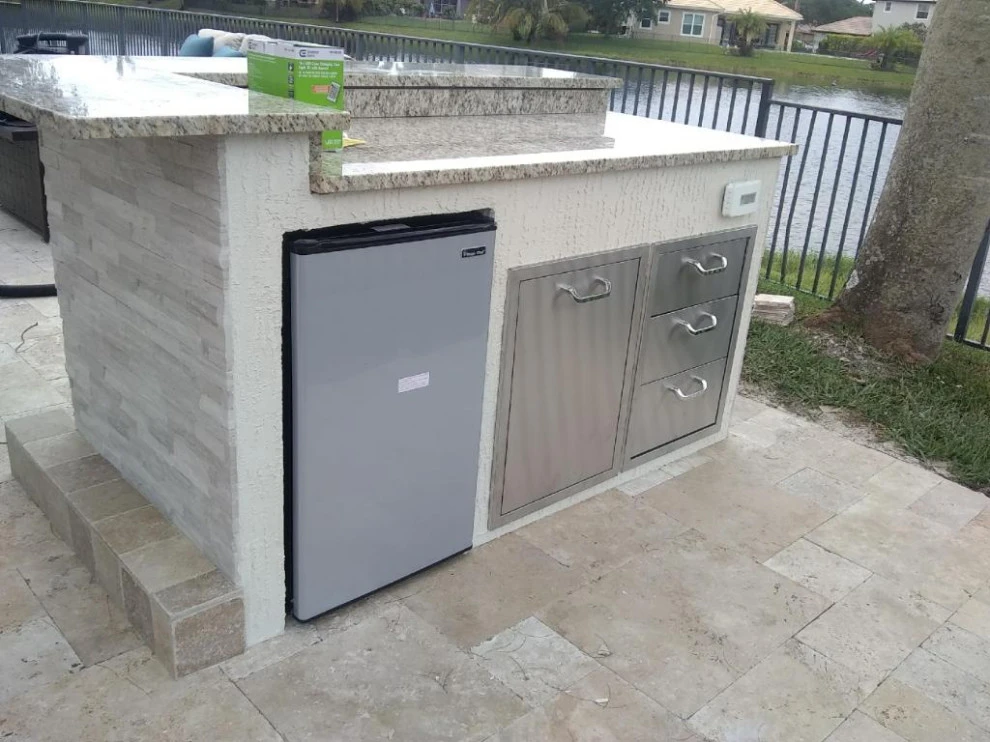 Outdoor Kitchen with Ledge Stone by Broward Landscape, Inc. - Photo 7