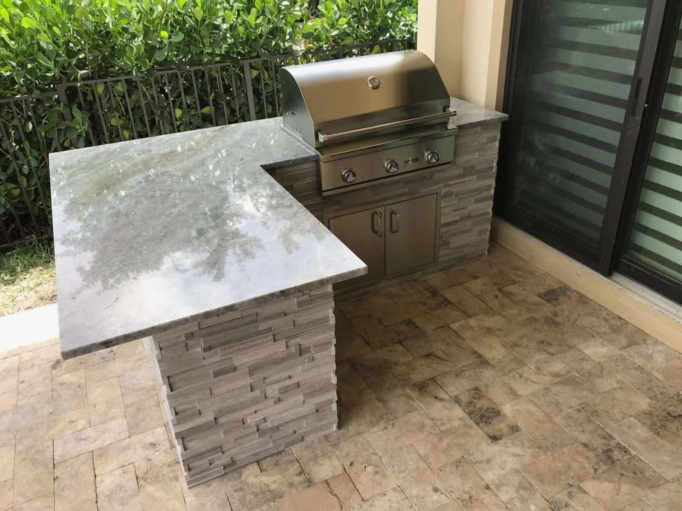 Outdoor Kitchen with Ledge Stone by Broward Landscape, Inc. - Photo 8
