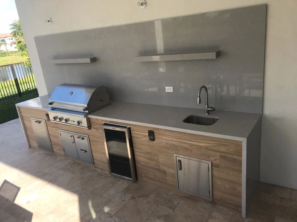 Outdoor Kitchen with Ledge Stone by Broward Landscape, Inc. - Photo 13