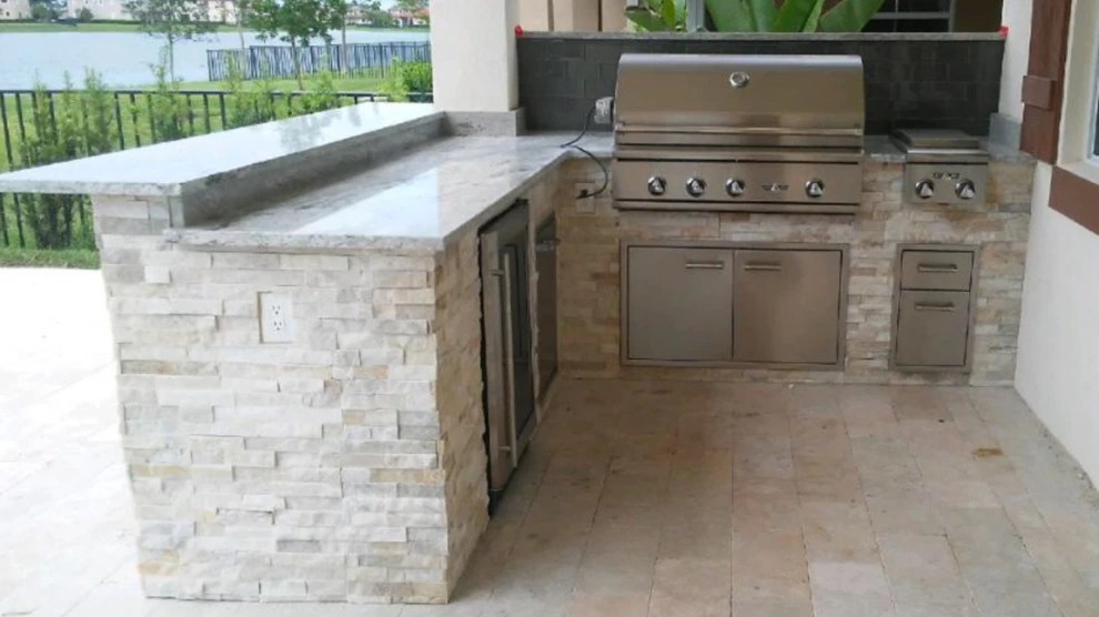 Outdoor Kitchen with Ledge Stone by Broward Landscape, Inc. - Photo 3